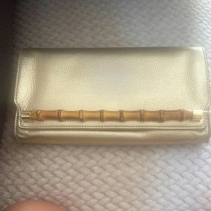 Lilly Pulitzer Gold clutch with bamboo handle